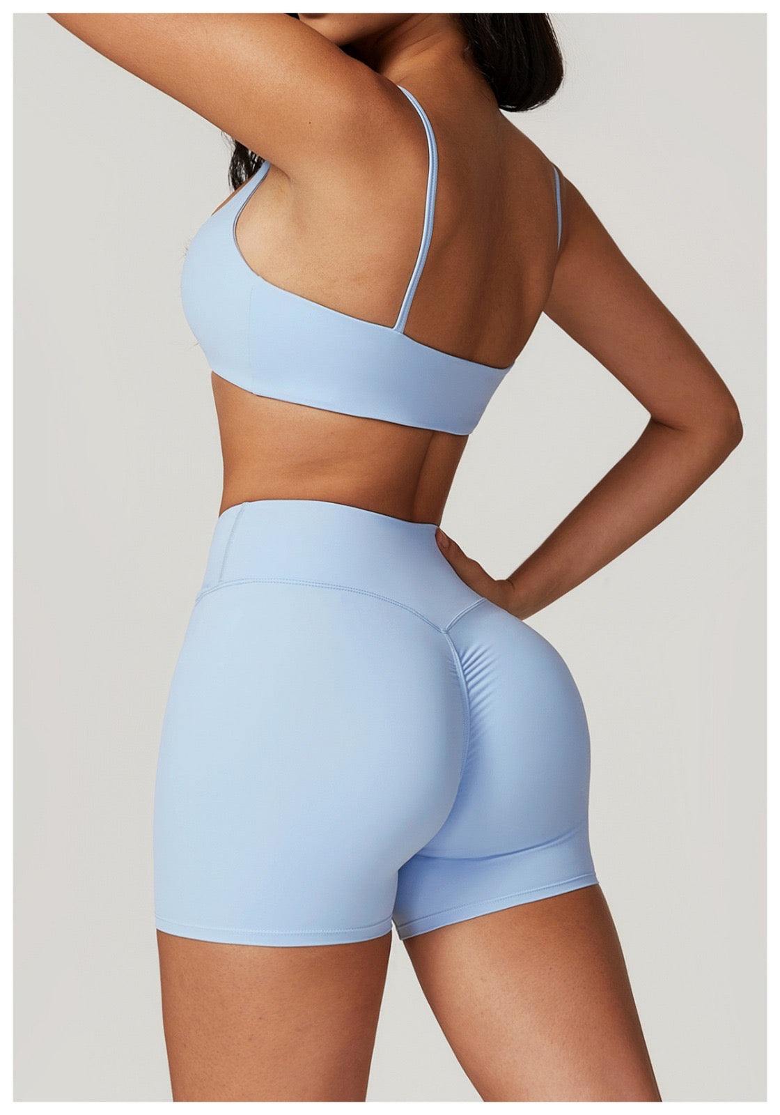 AuraCo Sports bra and shorts set in light blue, lightweight and breathable activewear with medium support and sleek design