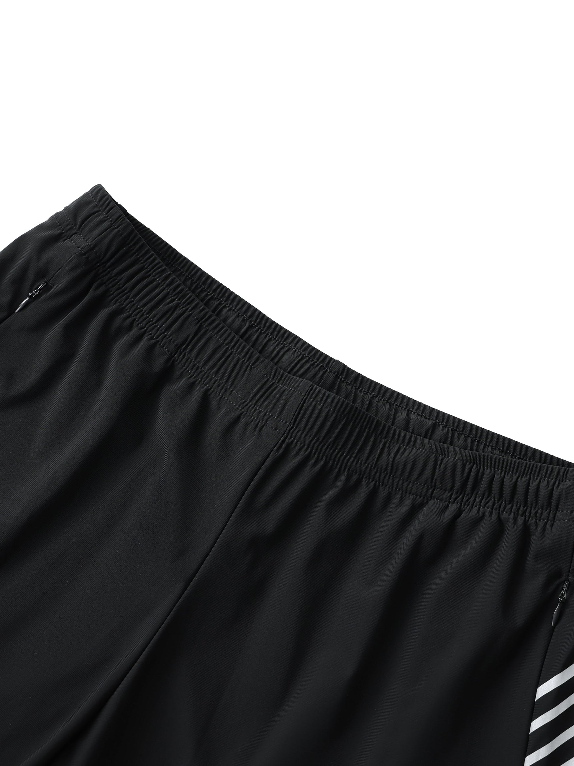Men's side-stripe performance shorts in black with elastic waistband and zipper pockets